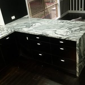 Bianco Rio Granite with dark cupboards